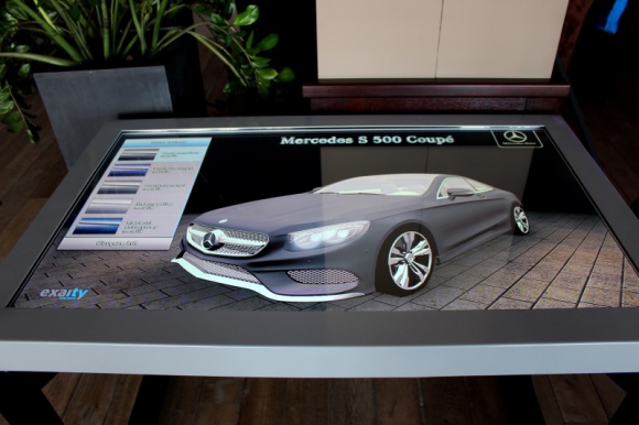 Premiera 3D najnowszego modelu Mercedesa BIZNES, IT i technologie - Podczas turnieju MercedesTrophy 2014, który odbył się w dniach 31 maja-1 czerwca na polu golfowym Toya Golf &Country Club we Wrocławiu, Exaity Group zaprezentowało stół interaktywny wraz z aplikacją dedykowaną dla marki Mercedes.